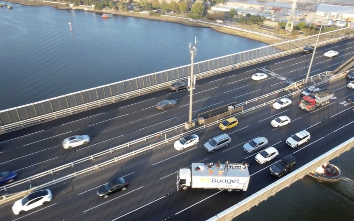 The Westgate Bridge, aerial view of truck and protesters