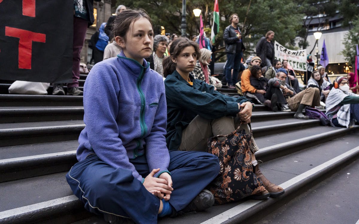 Young protesters on the steps of the State Library