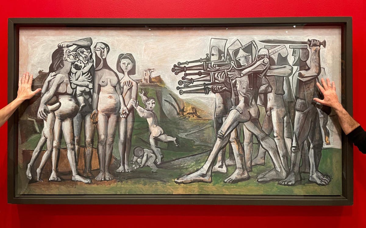 Extinction Rebellion activists glue on to Picasso painting at the NGV